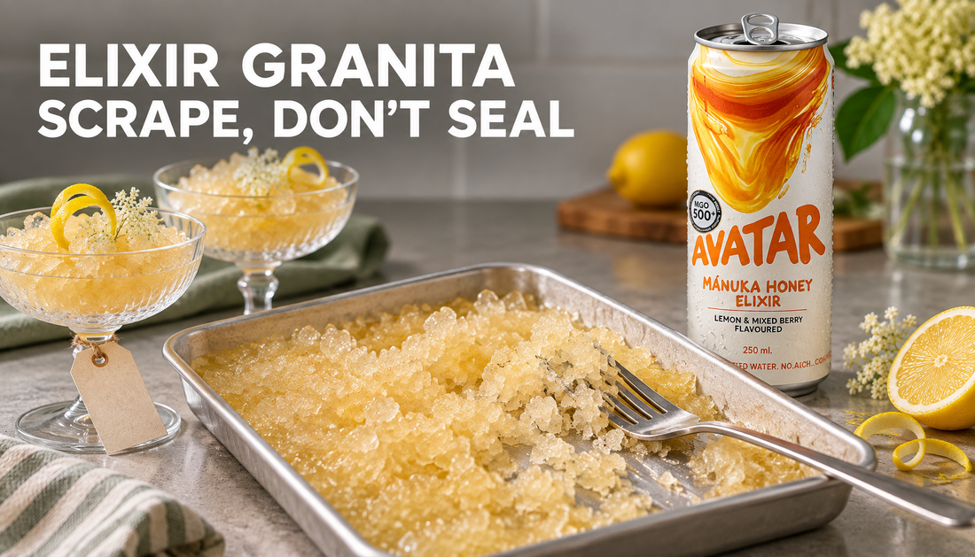 Avatar Elixir can beside a shallow tray of scraped honey lemon elderflower granita with a fork and serving dishes.