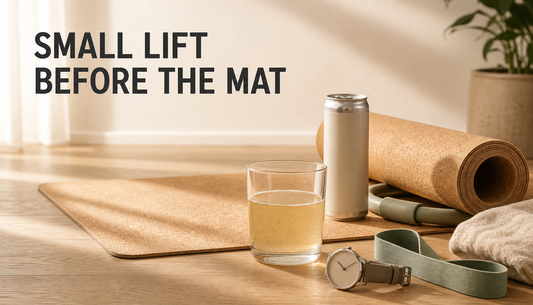 Calm yoga mat scene with a small half-poured natural energy drink, low fizz, a watch, and the headline Small Lift Before the Mat.