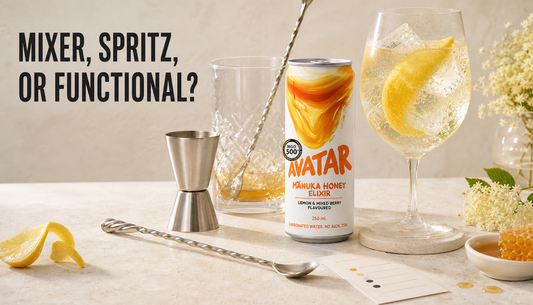 Avatar Elixir can on a warm tabletop between mixer tools, an iced spritz glass, and a blank ingredient-check card, with the headline “MIXER, SPRITZ, OR FUNCTIONAL?”