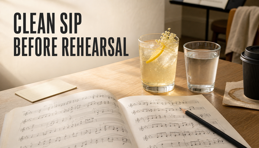 Pre-rehearsal table with a pale honey-lemon drink, water, sheet music, and pencil, with coffee pushed aside and the headline Clean Sip Before Rehearsal.