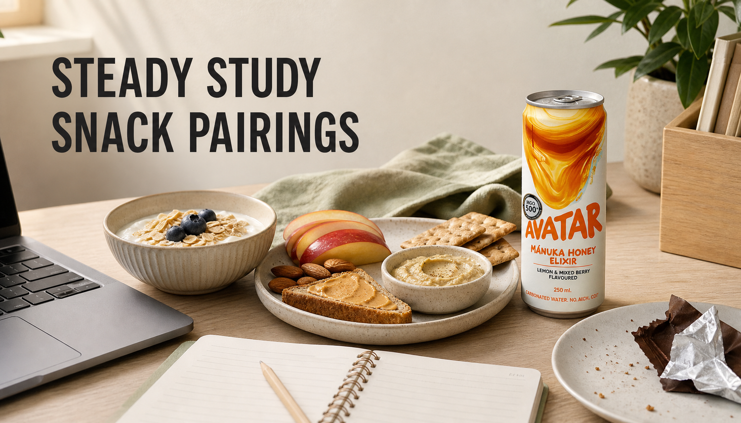 Avatar Elixir on a study desk beside yogurt with oats, fruit, nuts, toast, and light savory snacks with the headline Steady Study Snack Pairings.