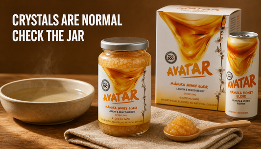 A sealed Manuka honey jar with visible crystals and a spoon of thick honey beside The Beekeeper’s Choice 12Pk, with the headline Crystals Are Normal, Check The Jar.