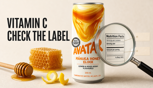 Avatar Elixir functional drink shown with a magnifying glass over its label and the headline Vitamin C, Check the Label.