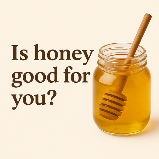 Jar of golden Manuka honey with dipper on a neutral background, overlaid with the words “What Is Honey Good For?” — a clean, wellness-inspired visual for a blog post about honey’s benefits.